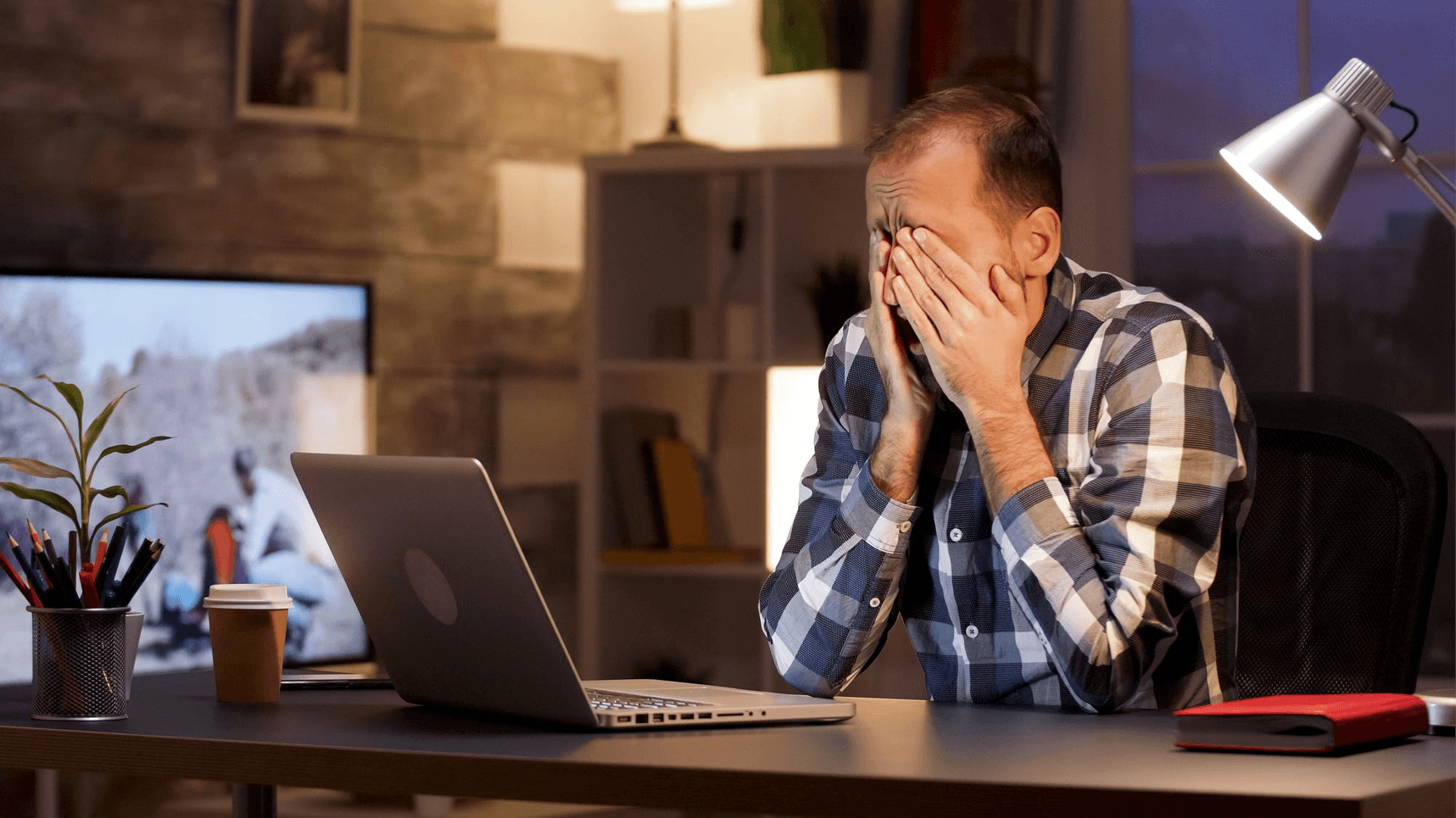 Frustrated person at desk